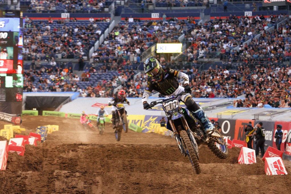 Cole Davies and Haiden Deegan mid-chase, both riders pushing aggressively.