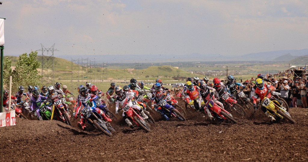 450 Class holeshot at Thunder Valley 2024 with riders leaned over in unison.