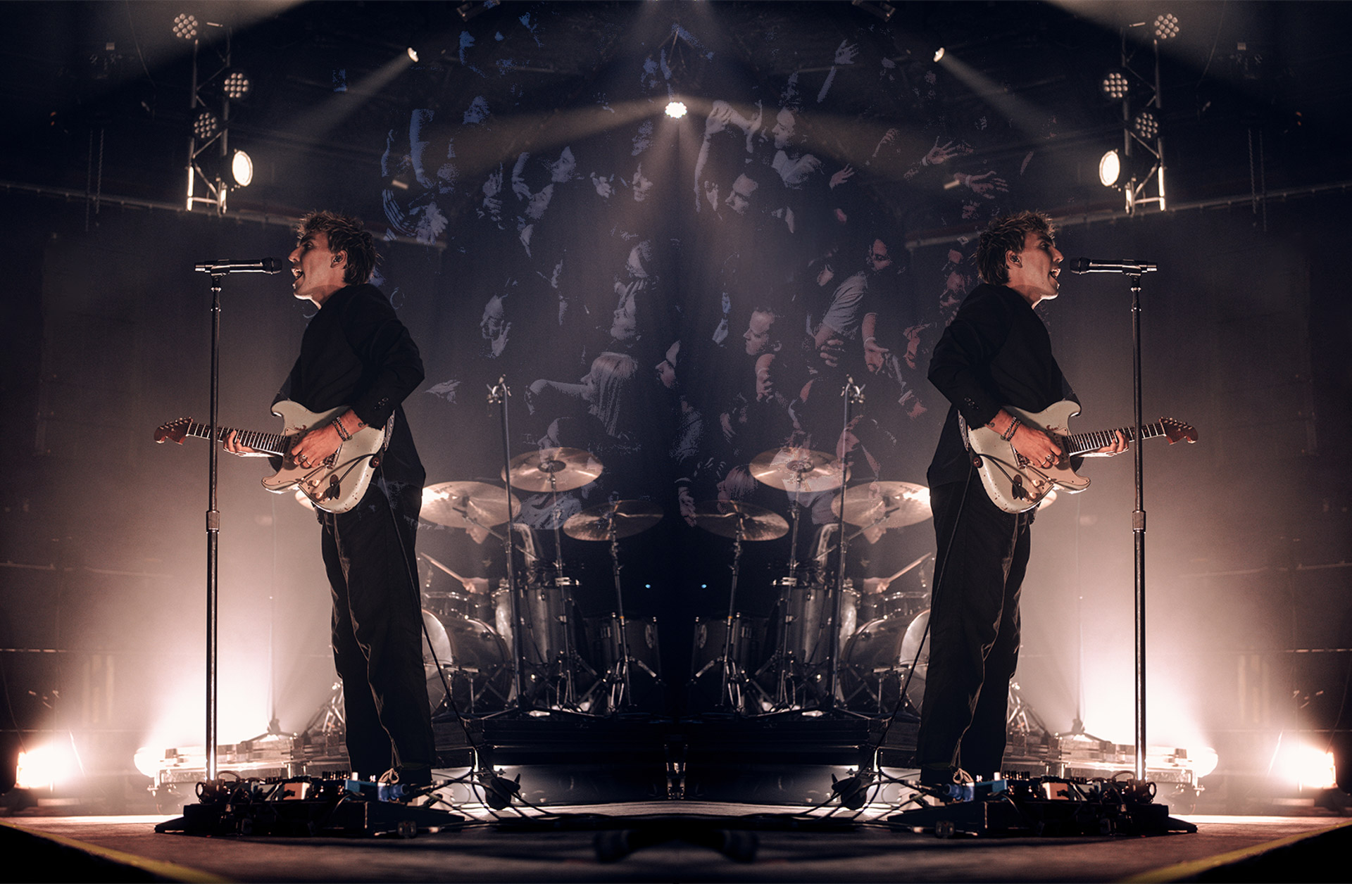 Christo Bowman from Bad Suns singing on stage in Denver, Colorado 2025, creative edit