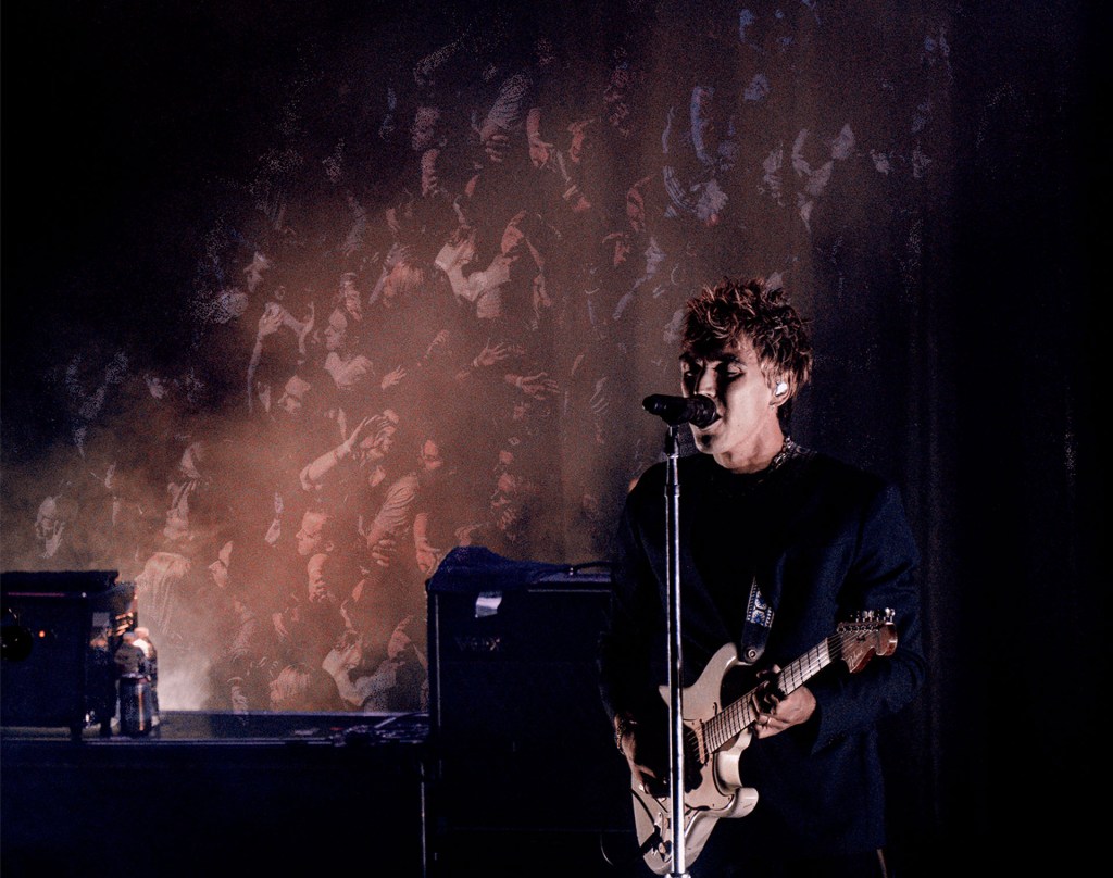 Christo Bowman from Bad Suns singing on stage in Denver, Colorado 2025. Creative Edited.