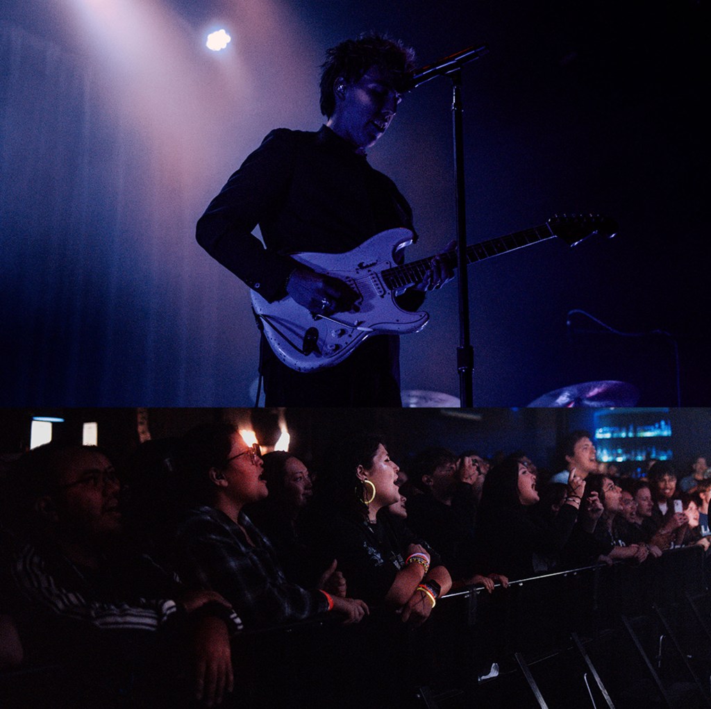 Christo Bowman from Bad Suns singing on stage to crowd in Denver, Colorado 2025