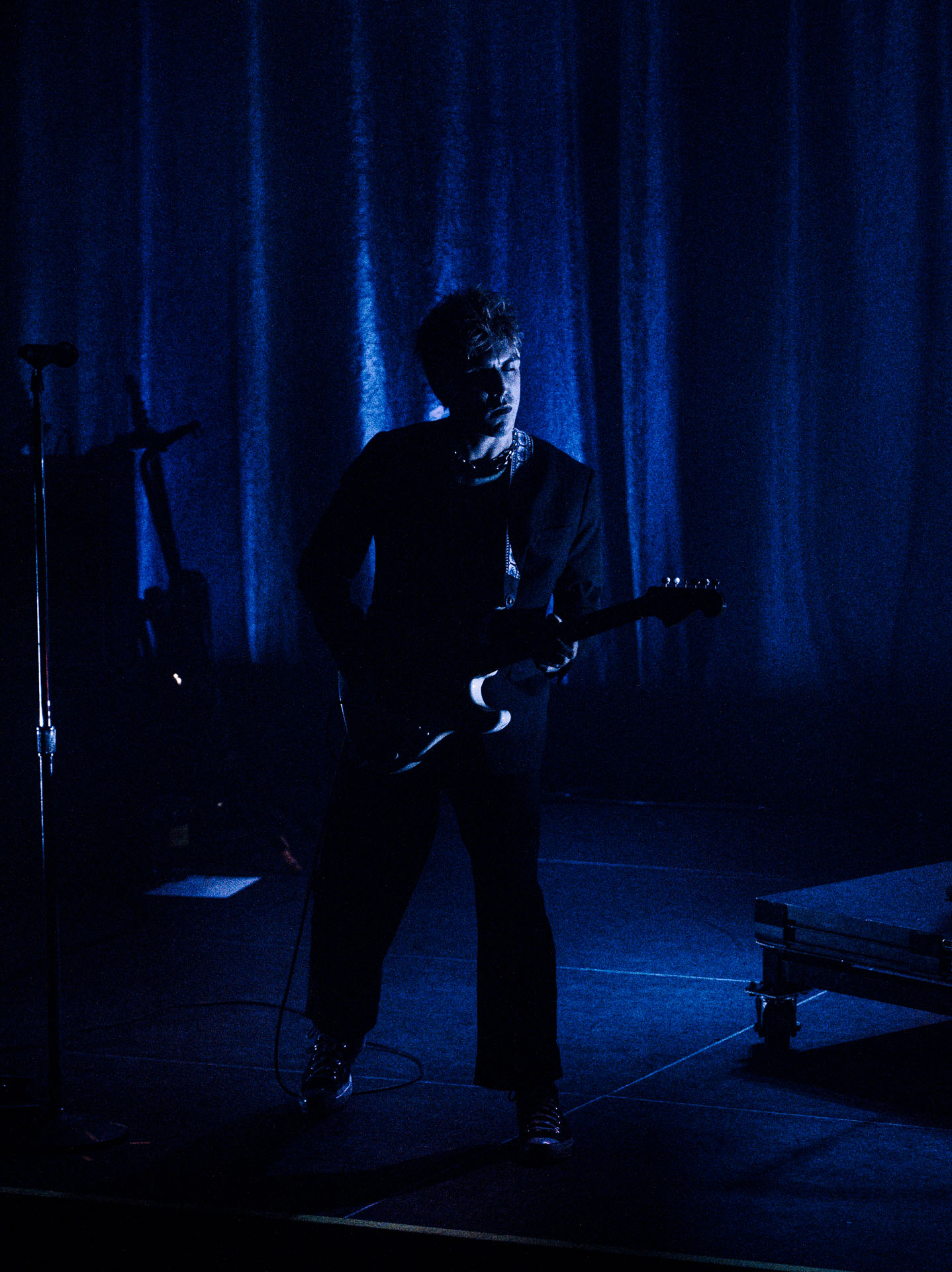 Christo Bowman from Bad Suns performing on stage in Denver, Colorado 2025